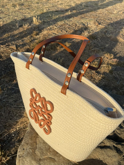 Sac de plage logo Loewe chic avec chapeau